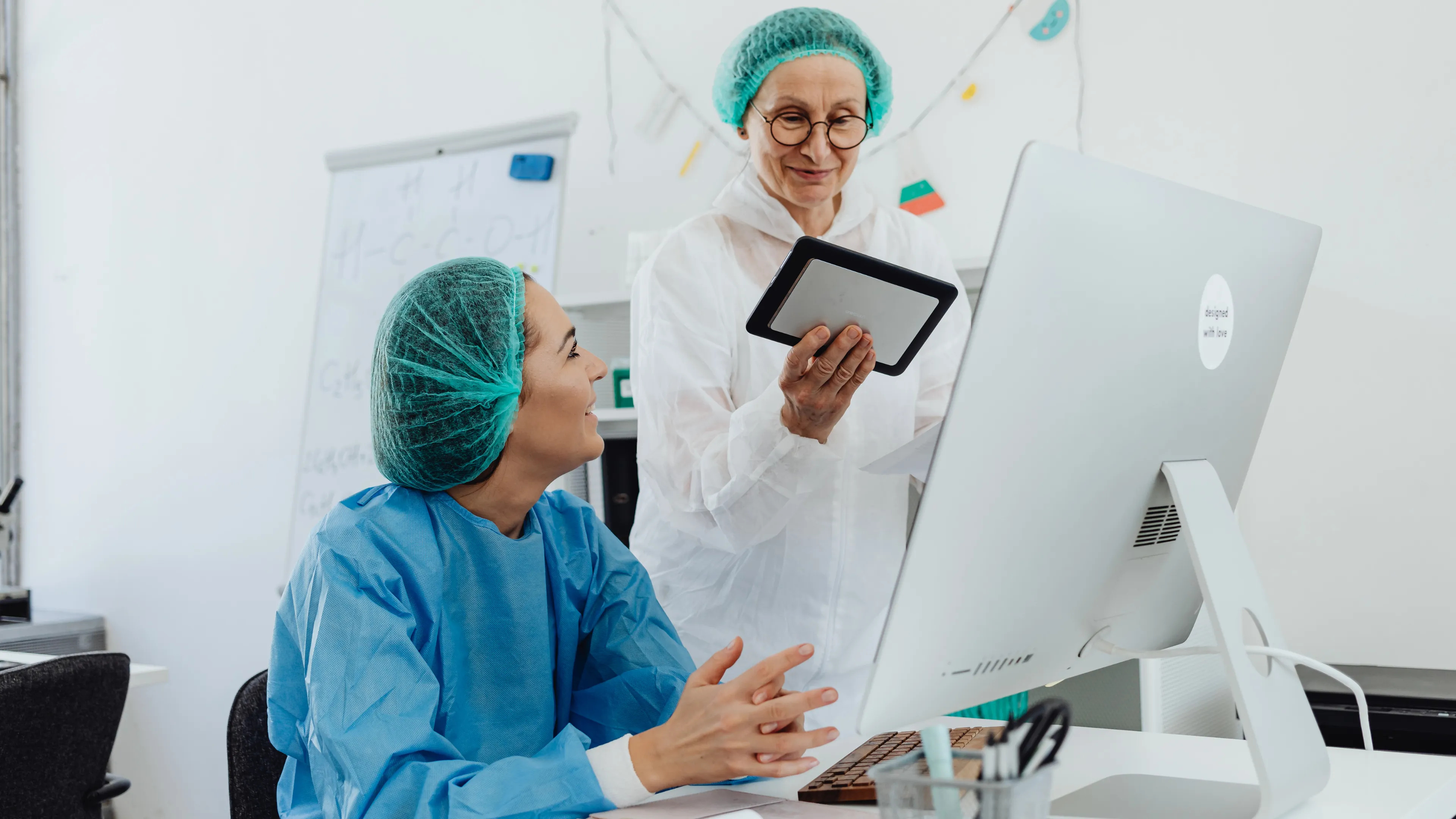 Clinical staff reviewing Oracle Health (Cerner) patient data
